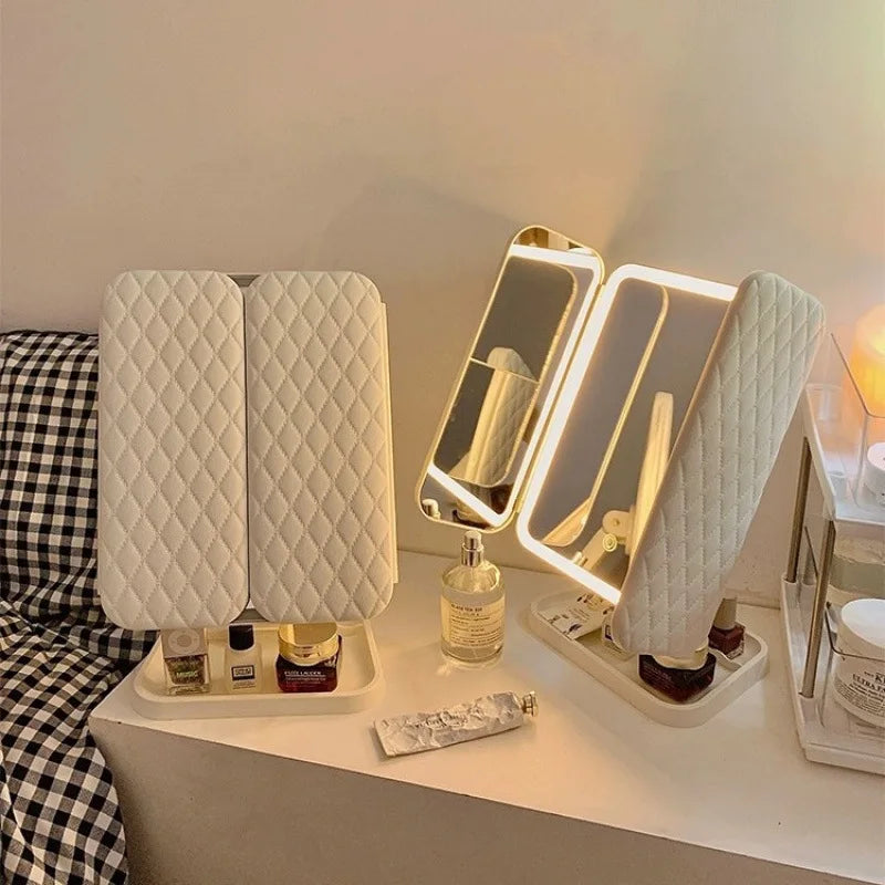 Espejo de Maquillaje Trifold LED con Aumento 3X – Luz Tricolor y Base Organizadora