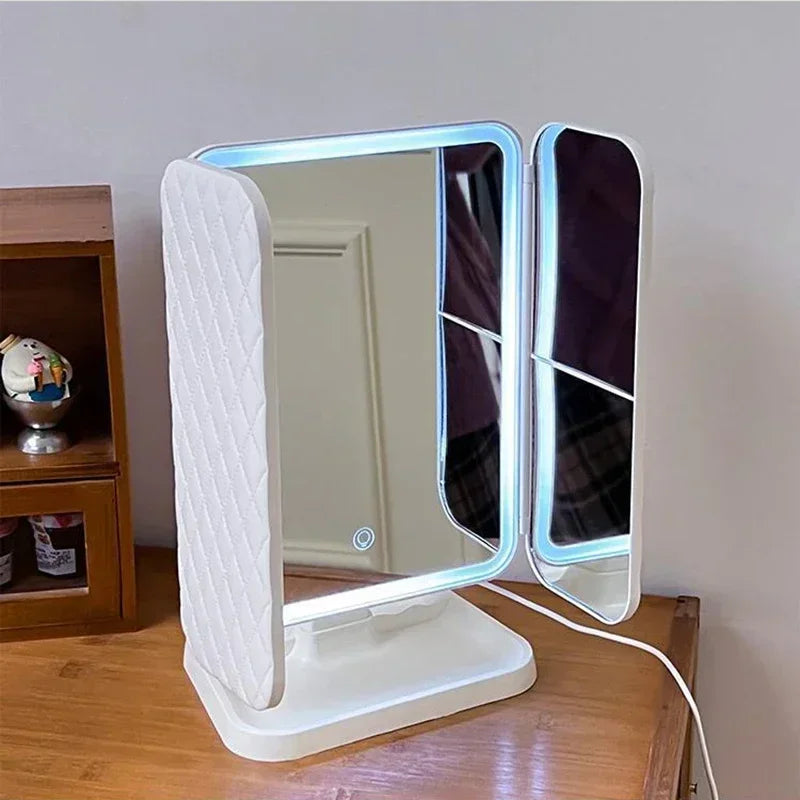 Espejo de Maquillaje Trifold LED con Aumento 3X – Luz Tricolor y Base Organizadora