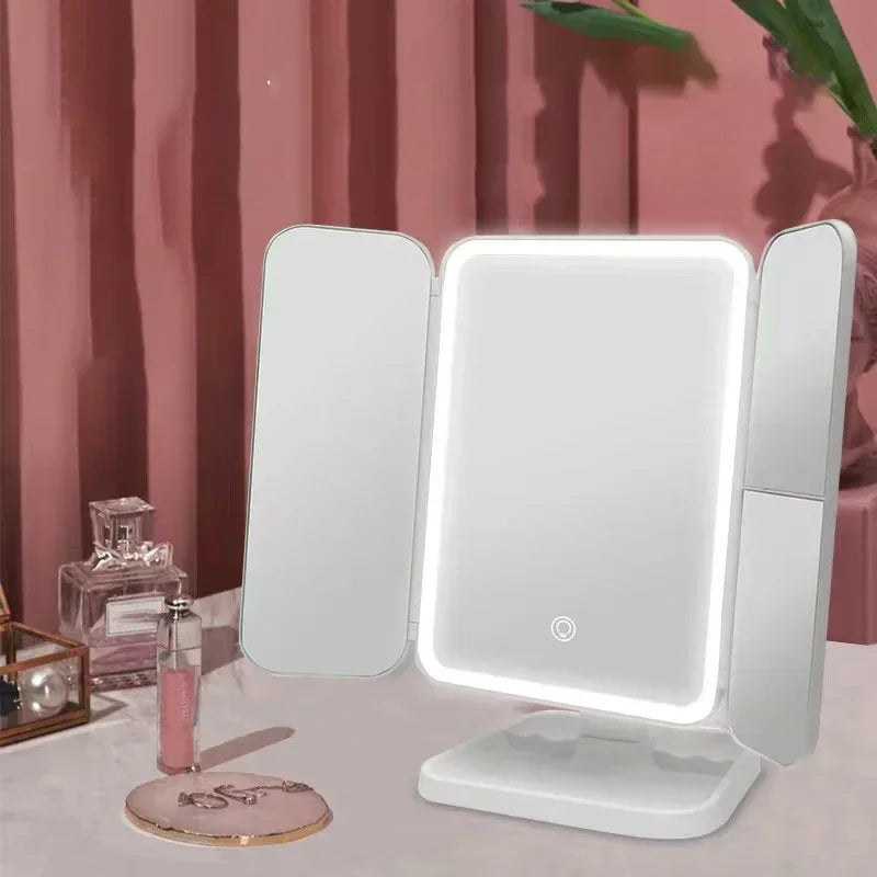 Espejo de Maquillaje Trifold LED con Aumento 3X – Luz Tricolor y Base Organizadora